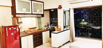 Kitchen in 3 BHK Apartment at Lakshmi Narayan Niwas, Dadar West – for Sale