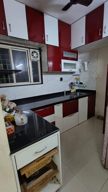 Kitchen in 2 BHK Apartment at Wadgaon Sheri – for Rent
