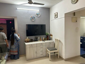 Living Room in 1 BHK Apartment at Ajmera Odyessey Apartment, Bhakti Park – for Rent