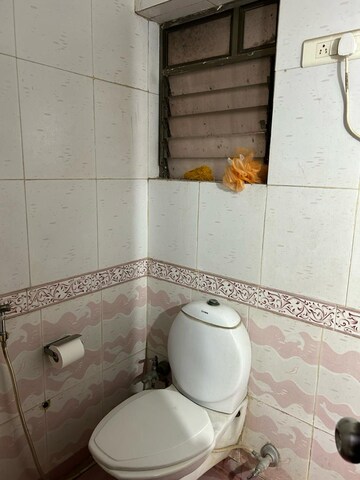 Bathroom in 1 BHK Apartment at Ajmera Odyessey Apartment, Bhakti Park – for Rent