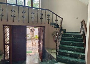 Staircase in 4 BHK Villa at Sainik Farm – for Sale