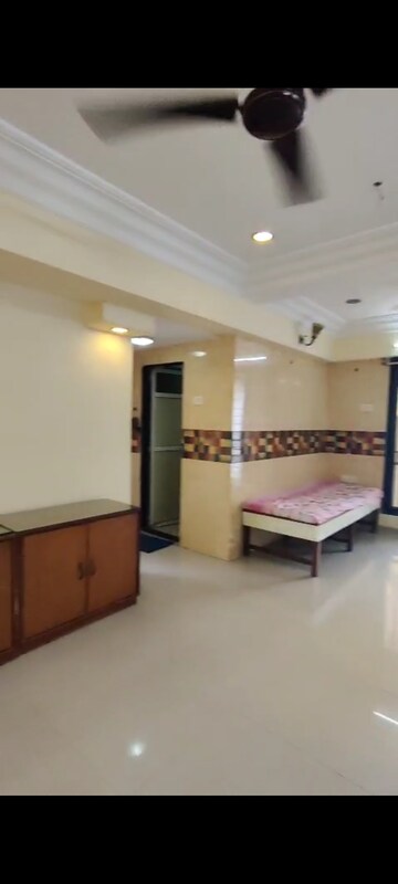 Living Room in 2 BHK Apartment at Vile Parle East – for Rent