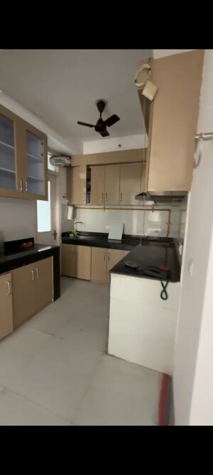 Kitchen in 2 BHK Apartment at Sarvottam NX Avenue, Tech Zone 4 Greater Noida – for Rent