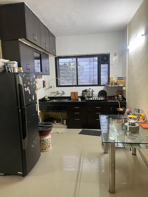 Kitchen in 2 BHK Apartment at Siddhivinayak Ambar CHS, Dhayari – for Rent