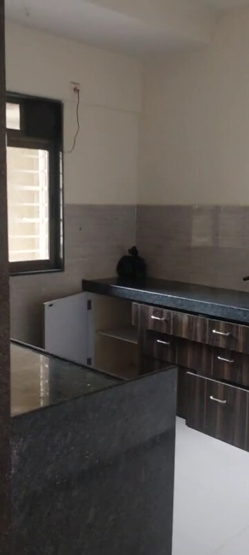Kitchen in 2 BHK Apartment at Acme Ozone, Manpada – for Sale
