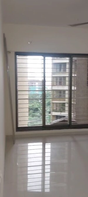 Room in 2 BHK Apartment at Acme Ozone, Manpada – for Sale