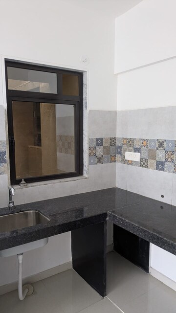 Kitchen in 1 BHK Apartment at Marathon NeoSkies, Utkarsh Nagar – for Rent