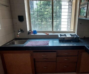Kitchen in 4 BHK Apartment at Meera Tower, Andheri West – for Sale
