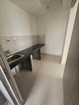 Kitchen in 2.5 BHK Apartment at PS One 10, New Town – for Sale
