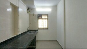 Kitchen in 2 BHK Apartment at Runwal Garden City, Balkum Pada – for Sale