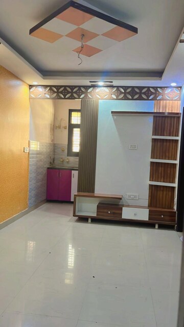 Living Room in 2.5 BHK Apartment at Aims Golf City, Sector 75 – for Rent