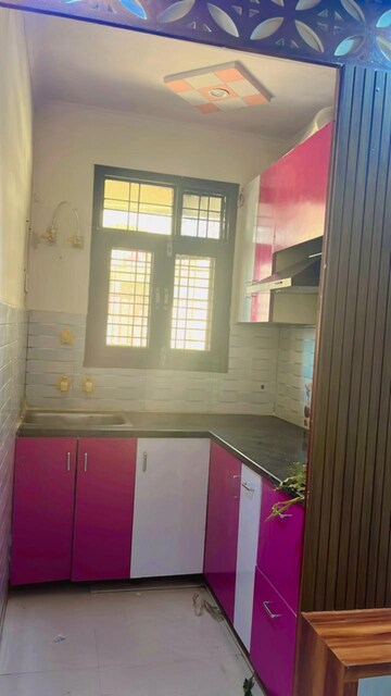 Kitchen in 2.5 BHK Apartment at Aims Golf City, Sector 75 – for Rent