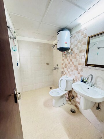 Bathroom in 3 BHK Apartment at Amrapali Crystal Homes, Sector 76 – for Rent