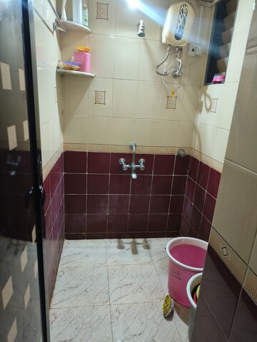 Bathroom in 2 BHK Apartment at Soham Parijat Gardens, Ghodbunder Road – for Rent