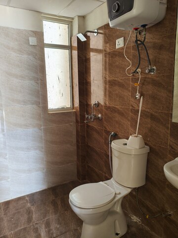Bathroom in 3 BHK Apartment at Amrapali Crystal Homes, Sector 76 – for Rent