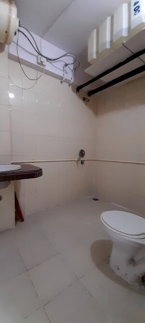 Bathroom in 2 BHK Apartment at Royal Palms Garden View, Goregaon East – for Sale