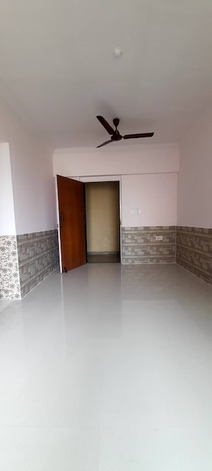 Room in 2 BHK Apartment at Royal Palms Garden View, Goregaon East – for Sale