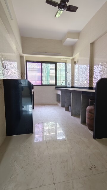 Kitchen in 2 BHK Builder Floor at Mulund East – for Sale