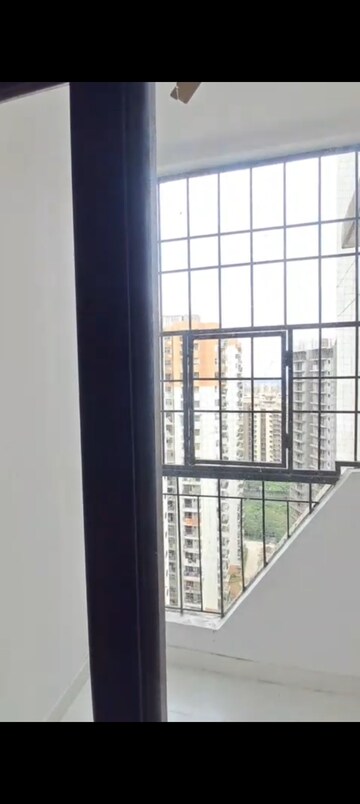 Room in 2 BHK Apartment at Charms Castle, Raj Nagar Extension – for Rent