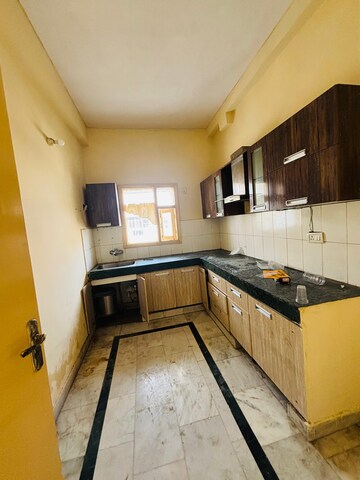 Kitchen in 4 BHK Apartment at Prateek Residency, Phi Iii Greater Noida – for Rent