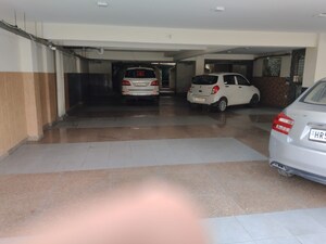 Parking in 4 BHK Builder Floor at Zion Onyxe Tower, Sector 21c – for Sale