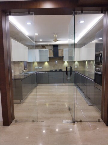 Kitchen in 4 BHK Apartment at Veera Safdarjung Enclave, Safdarjung Enclave – for Sale