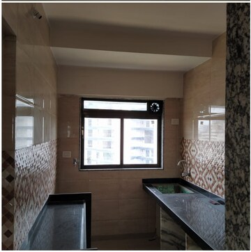 Kitchen in 2 BHK Apartment at AVN Silver Skyline, Andheri West – for Sale