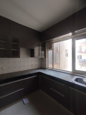 Kitchen in 2 BHK Apartment at ROF Aalayas, Sector 102 – for Sale