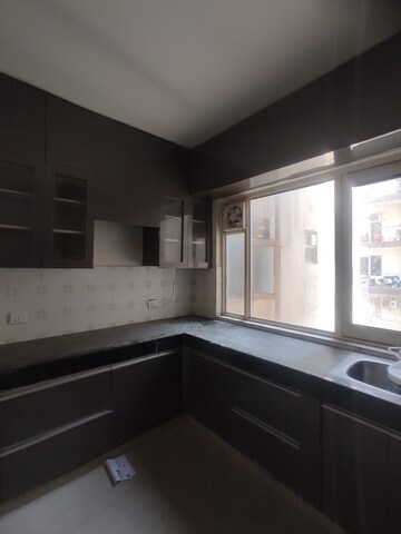 Kitchen in 2 BHK Apartment at ROF Aalayas, Sector 102 – for Sale