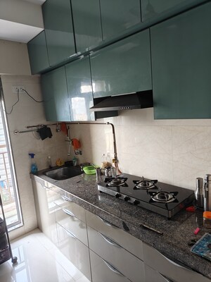 Kitchen in 1.5 BHK Apartment at Metropolis Bayside, Kasarvadavali – for Sale