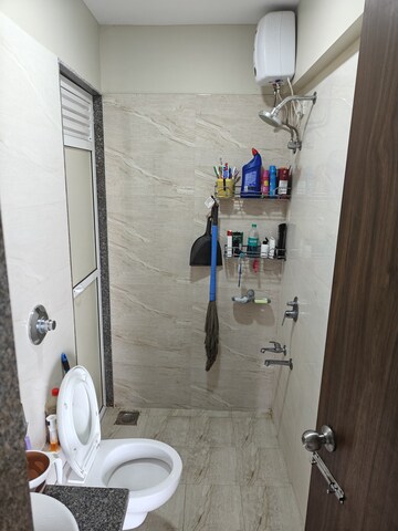 Bathroom in 1.5 BHK Apartment at Metropolis Bayside, Kasarvadavali – for Sale