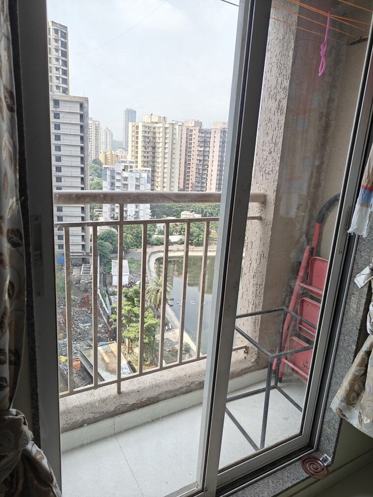 Balcony, metropolis-bayside 1.5 Bedroom 700 Sq.Ft. Apartment In Kasarvadavali Thane 9212685