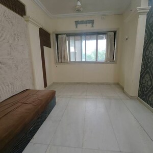 Living Room in 1 BHK Apartment at Malad SC CHS, Vijaykar Wadi – for Rent