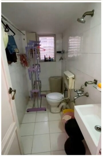 Bathroom in 3 BHK Apartment at Dakshina Park, Vile Parle West – for Sale