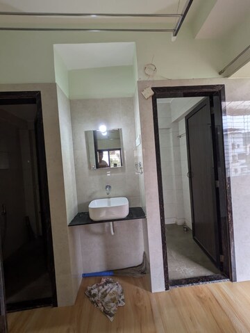 Bathroom in 1 BHK Apartment at Kedar Lokpuram CHS, Vasant Vihar – for Rent
