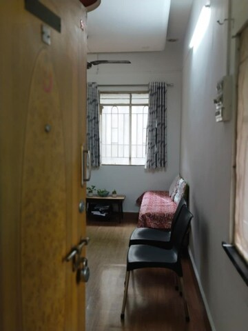 Living Room in 1.5 BHK Apartment at Rambaug Colony – for Sale