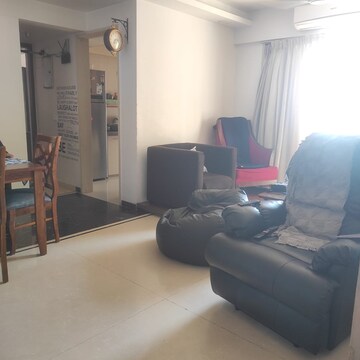 Living Room in 2 BHK Apartment at Pearl Heights, Yari Road – for Sale