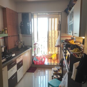 Kitchen in 2 BHK Apartment at Pearl Heights, Yari Road – for Sale