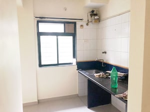 Kitchen in 1 BHK Apartment at Puranik City, Kasarvadavali – for Sale