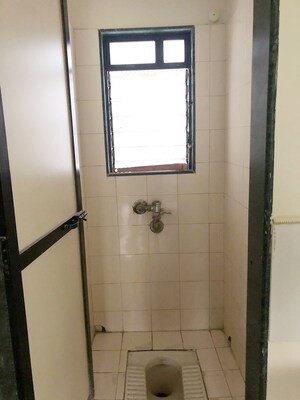 Bathroom in 1 BHK Apartment at Puranik City, Kasarvadavali – for Sale