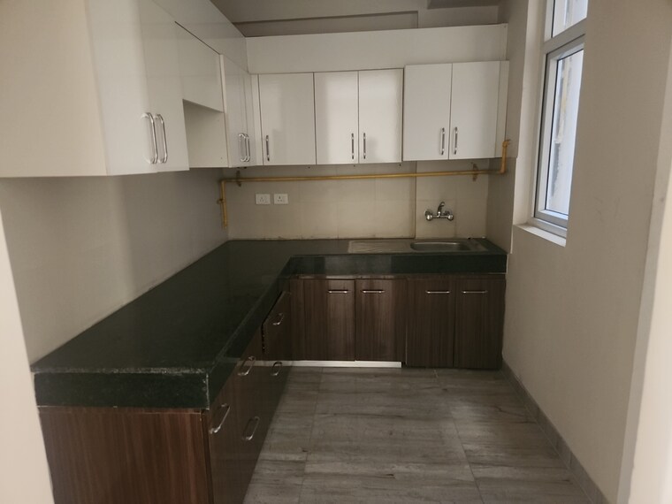 Kitchen, wave-executive-floors 2 Bedroom 900 Sq.Ft. Apartment In Wave City Ghaziabad 9213096