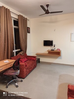 Living Room in Studio Apartment at Supertech Czar Suites, Omicron I Greater Noida – for Sale