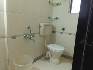 Bathroom in 1 BHK Apartment at Dheeraj Solitaire, Malad West – for Rent