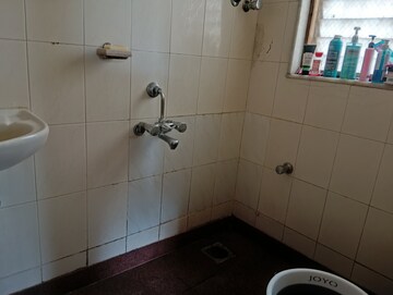 Bathroom in 1 BHK Apartment at Kalpataru Shravasti, Malad West – for Rent