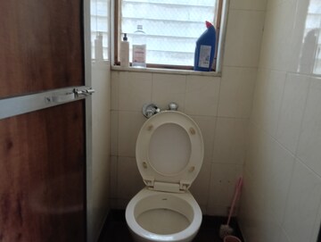 Bathroom in 1 BHK Apartment at Kalpataru Shravasti, Malad West – for Rent