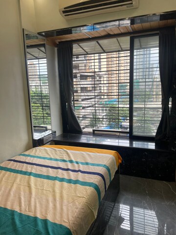 Bedroom in 2 BHK Apartment at Divya Stuti CHS, Goregaon East – for Rent