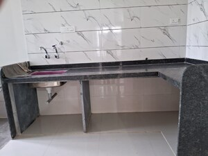 Kitchen in 1 BHK Apartment at Paranjape Schemes Abhiruchi Parisar, Dhayari – for Sale