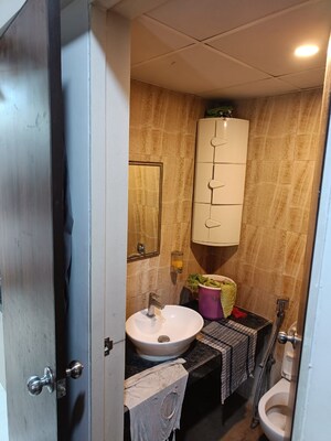 Bathroom in 3 BHK Apartment at Group Seven Rushi Heights, Goregaon East – for Rent