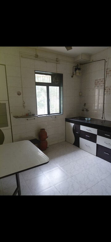 Kitchen in 2 BHK Apartment at Vedant Complex CHS, Samata Nagar – for Rent