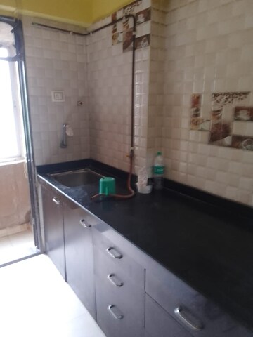 Kitchen in 1 BHK Apartment at Om Sai Tower, Dahisar West – for Rent
